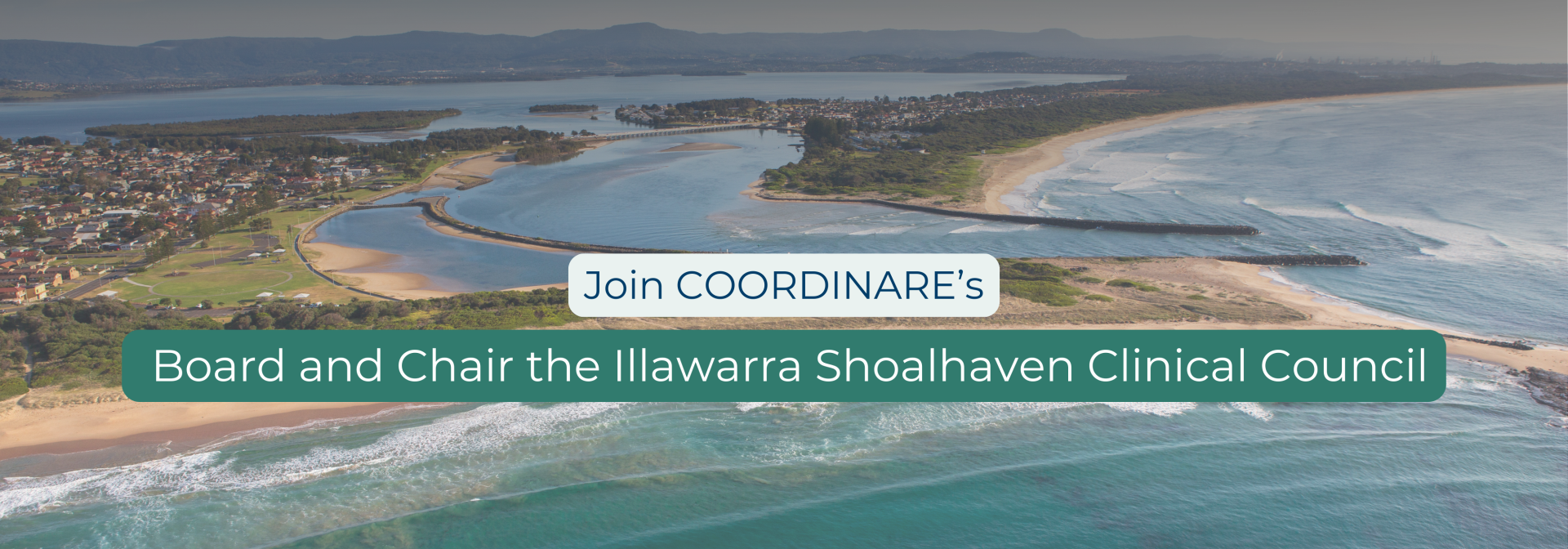 Woman smiling at table with friends.